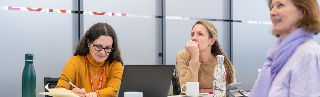 The team at London & Partners working at a desk