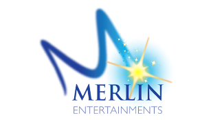 A logo of a blue stylised capital letter M with a yellow star, on top of text that reads Merlin Entertainments in blue font against a white background.