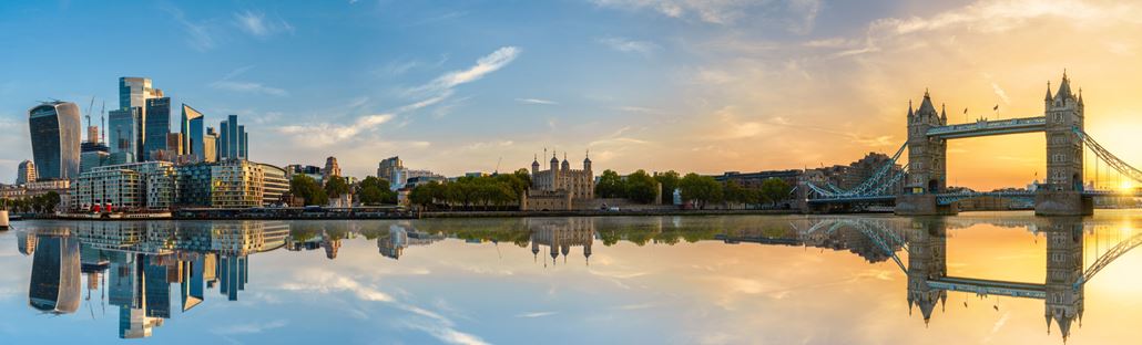 The City of London, Tower of London and Tower Bridge at sunset