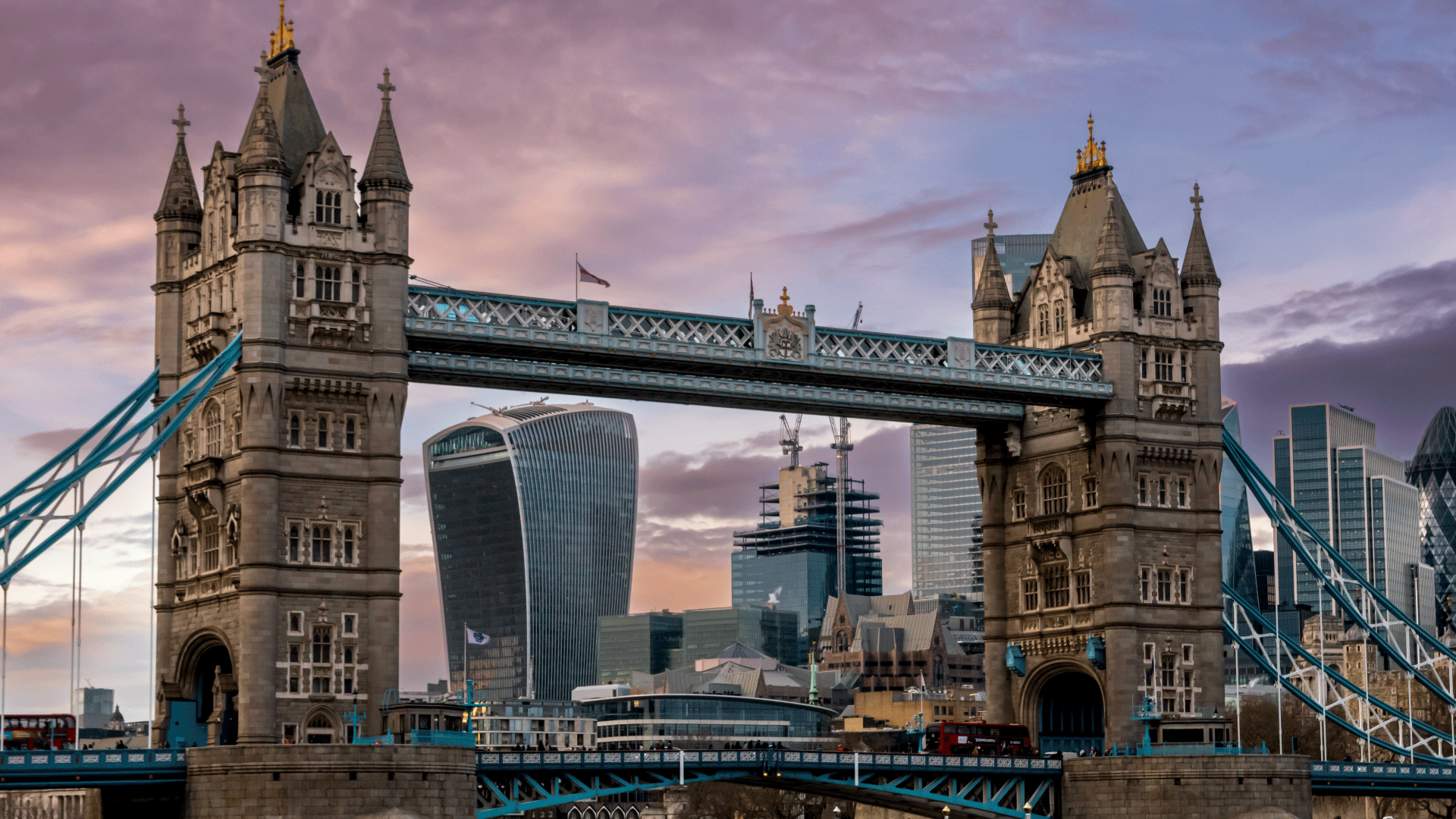 View of Tower Bridge with high rise buildings in background including walkie talkie